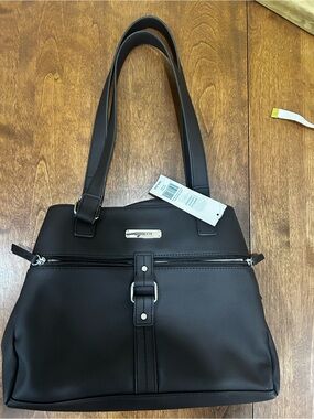 Chocolate brown purse by Rosetti. New with tag